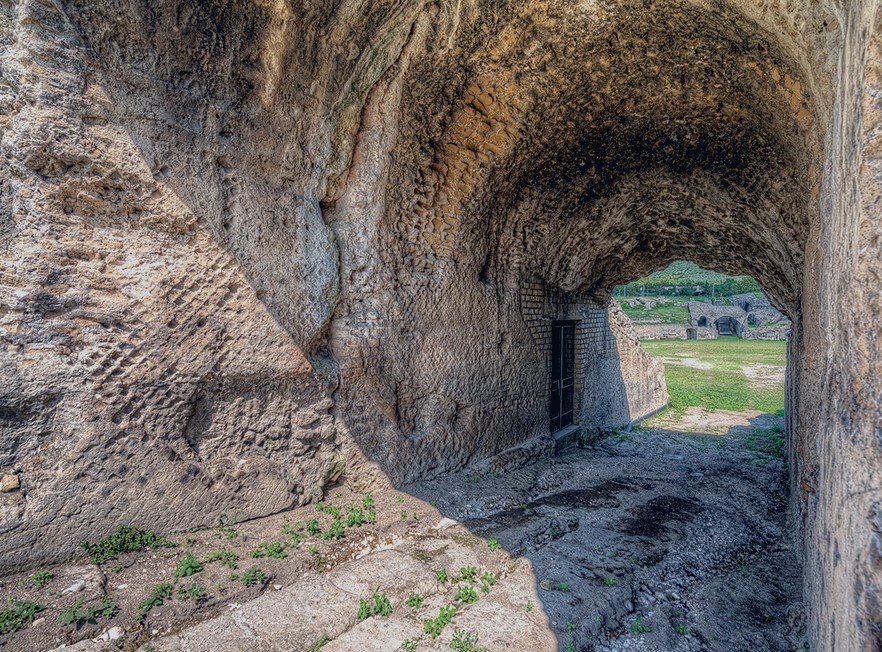 Abella's Roman amphitheater constructed in opus reticulatum (stonework)