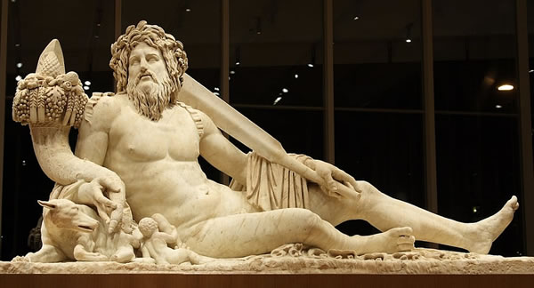 Large sculpture of Tiber river in the Louvre Museum (Paris, France).