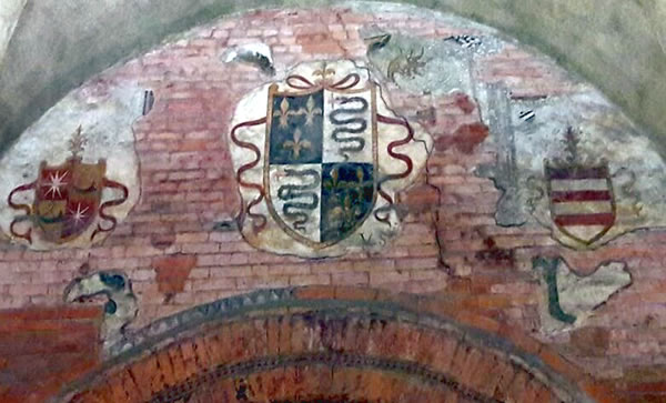 Visconti Viper and the coat of arms with the lilies of the King of France - Municipal Palace of Cremona (Italy)