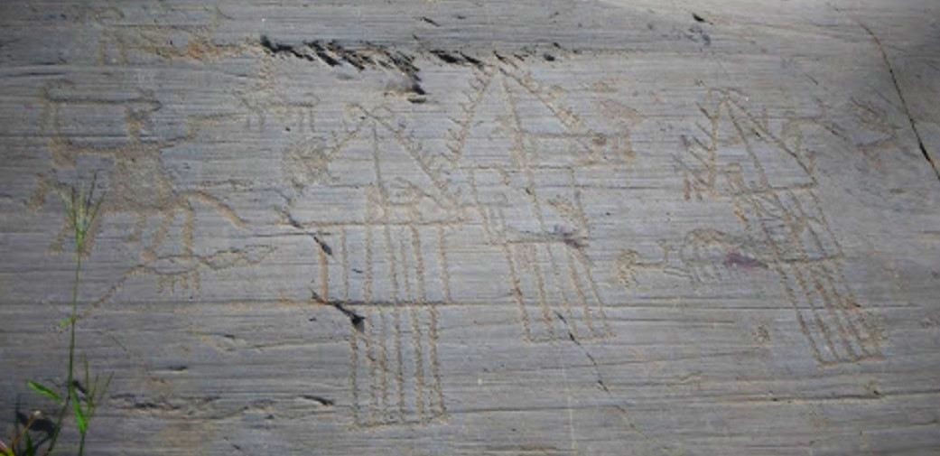This panel illustrates a series of constructions (dwellings, granaries, temples) superimposed over a hunting scene; thus, a number of these figures (dogs, deer) appear within the structures, even if they were made years before by another person. At times an anthropomorph materialises inside the buidings, arguably representing a simulacrum or statue of a divinity, but without giving any clue as to the function of the edifice. Maybe the constructions were superimposed over the hunting scene in order to place events around the village in perspective: hunting on foot or horseback, armed combat, work and religious acts.