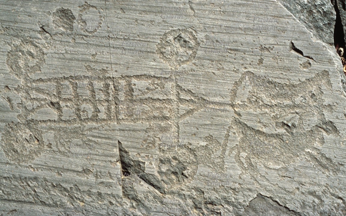 n engraving depicting a four-wheeled cart pulled by equidae (Iron Age, first half of the first millenium BCE), Valcamonica