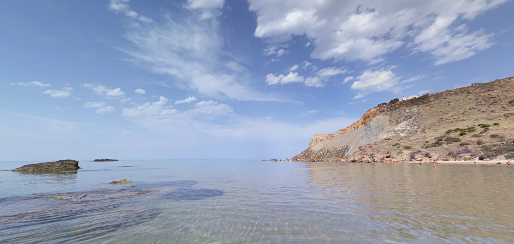 View of Capo Rossello, the site where the australopithecus' remains were found on the top right (Realmonte, Agrigento, Italy).