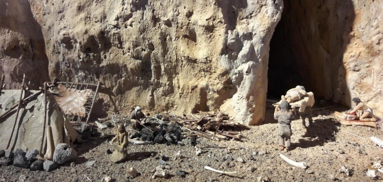 Reconstruction of a hypothetical moment of life in the Upper Paleolithic in the Caviglione Cave - the Balzi Rossi Prehistoric Museum.